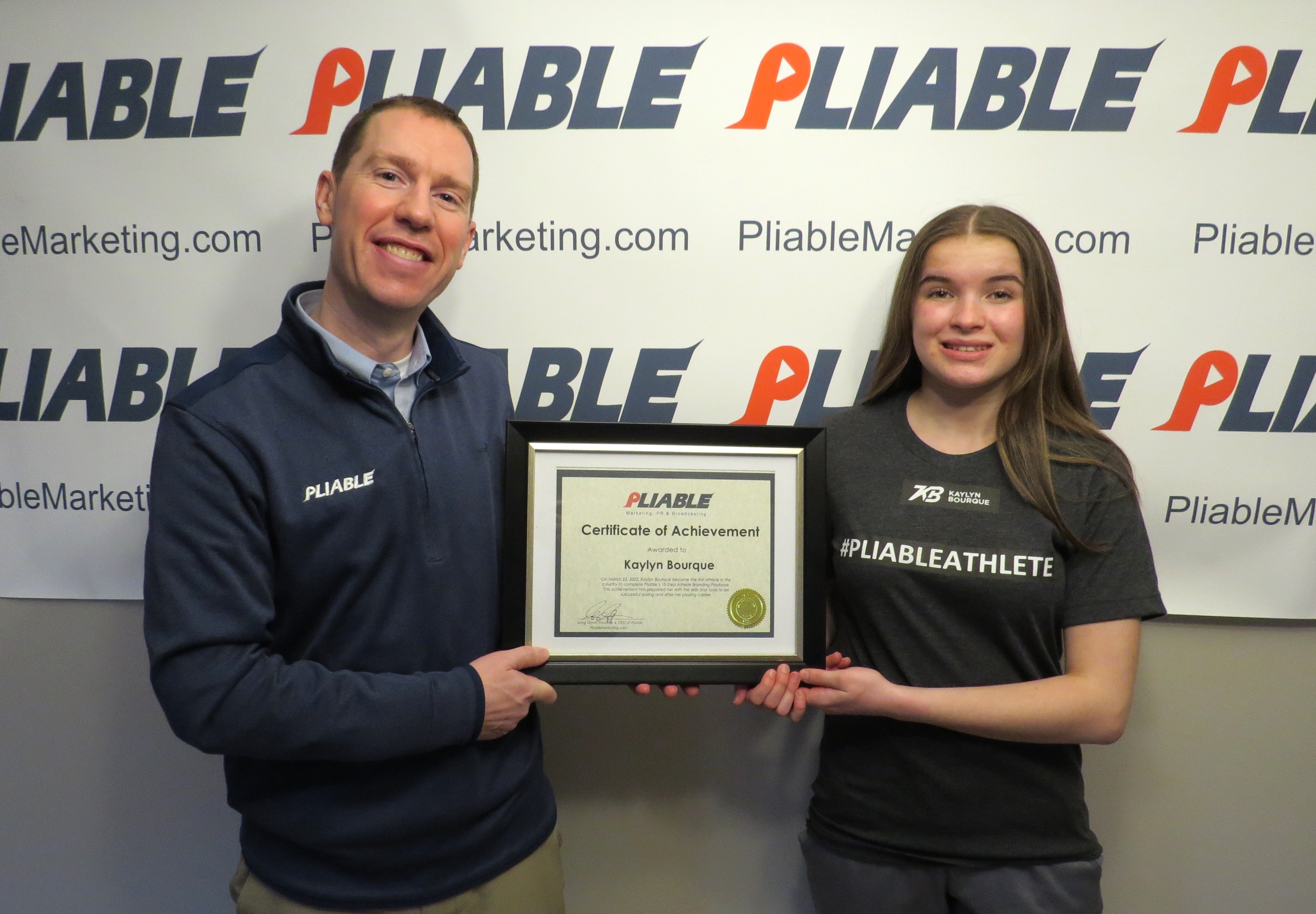 Photo of Greg Glynn, Athlete Brand Advisor & CEO of Pliable and Kaylyn Bourque, sophomore at Lawrence High School.